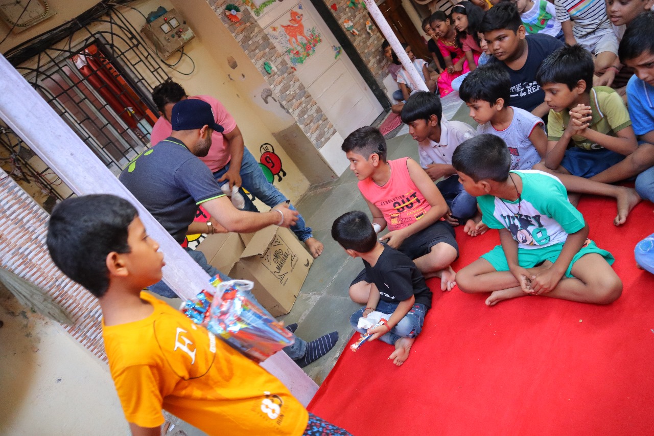Spreading Joy: Snacks Distribution & Play Event at Dahisar Ganesh Nagar by My Karma Foundation